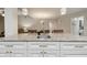Kitchen island with granite countertops and sink, perfect for food preparation at 6703 Towhe Dr, Seffner, FL 33584