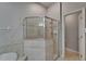 Bright bathroom showcases a corner shower with glass enclosure at 6801 Bishops Pointe Way, Riverview, FL 33578