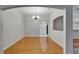 Formal dining room with hardwood floors and chandelier lighting at 6801 Bishops Pointe Way, Riverview, FL 33578