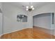 Inviting dining area with hardwood flooring and ample natural light at 6801 Bishops Pointe Way, Riverview, FL 33578