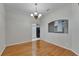 Elegant dining room with hardwood floors and chandelier at 6801 Bishops Pointe Way, Riverview, FL 33578