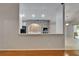 View of the kitchen's brick oven, modern appliances, and tile flooring at 6801 Bishops Pointe Way, Riverview, FL 33578
