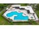 Overhead view of community pool with beach volleyball court and lounging areas at 6801 Bishops Pointe Way, Riverview, FL 33578