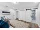 This spacious bedroom includes a sliding door to the bathroom and a closet at 8307 Boxwood Dr, Tampa, FL 33615