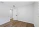 Bright room with hardwood floors and neutral paint throughout at 8307 Boxwood Dr, Tampa, FL 33615