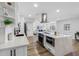 Spacious open concept kitchen features an island and view into the living room at 8307 Boxwood Dr, Tampa, FL 33615