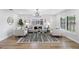 Bright living room with neutral tones, modern decor, and hardwood floors at 8307 Boxwood Dr, Tampa, FL 33615