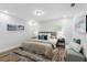 Relaxing main bedroom with decorative rug, accent pillows, and plenty of natural light at 8307 Boxwood Dr, Tampa, FL 33615