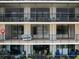 Multiple balconies, each with seating areas, offering great views and outdoor living space at 100 Oakmont Ln # 305, Belleair, FL 33756