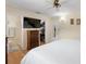 Bright main bedroom featuring a walk-in closet and en-suite bathroom at 10415 124Th Ter, Largo, FL 33773