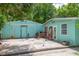 Street view single story home with driveway, emphasizing its curb appeal potential and garage access at 10854 Telford St, New Port Richey, FL 34654