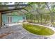 Screened pool and access to home, highlighting the potential and outdoor connection at 10854 Telford St, New Port Richey, FL 34654