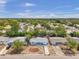 Aerial view of the house, showcasing its landscaping, neighborhood and surrounding area at 10900 Queens Rd, Port Richey, FL 34668