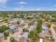 Wide aerial view of the neighborhood and the community at 10900 Queens Rd, Port Richey, FL 34668