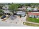 Single-story home in a residential neighborhood with zero-scape front yard and a stone facade garage at 1150 Grand Blvd, Holiday, FL 34690