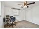Bedroom providing built-in desk area and closet at 1150 Grand Blvd, Holiday, FL 34690