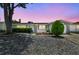 Charming single-story home with stone accents and a well-maintained front yard at 1150 Grand Blvd, Holiday, FL 34690