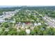 Scenic aerial view of property nestled in a lush, green neighborhood with downtown views at 116 W Chelsea St, Tampa, FL 33603