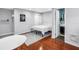 Neutral bedroom featuring a minimalist aesthetic with hardwood floors and closet at 116 W Chelsea St, Tampa, FL 33603
