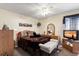 Warm bedroom featuring plush bedding, ambient lighting, and a relaxing atmosphere at 12307 Villager Ct, Tampa, FL 33625