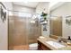 Modern bathroom features a glass shower and beautiful tiled walls at 12309 Creek Edge Dr, Riverview, FL 33579