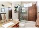 Modern bathroom features a glass shower and granite countertops at 12309 Creek Edge Dr, Riverview, FL 33579