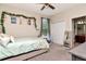 Bright bedroom featuring a ceiling fan, large closet and decor at 12309 Creek Edge Dr, Riverview, FL 33579