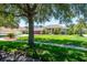 Well-manicured lawn and long driveway lead to the beautiful home at 12309 Creek Edge Dr, Riverview, FL 33579