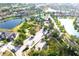 Beautiful aerial view of a residential community with lush landscaping, ponds, and winding roads, offering a serene living environment at 13327 Waterleaf Garden Cir, Riverview, FL 33579
