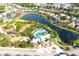 Gorgeous aerial view of a Primary-planned community featuring ponds, parks, and well-maintained homes at 13327 Waterleaf Garden Cir, Riverview, FL 33579