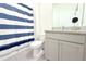 Neutral bathroom featuring a vanity and a shower tub at 13327 Waterleaf Garden Cir, Riverview, FL 33579