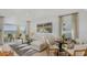 Bright living room with lots of natural light and neutral color scheme at 13556 Tropical Breeze Way, Hudson, FL 34669