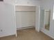 Bedroom closet featuring double doors, a mirror, and ample storage space at 138 36Th N Ave # 206W, St Petersburg, FL 33704