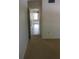 Hallway offering a glimpse of the tiled entryway and a bright, inviting space at 138 36Th N Ave # 206W, St Petersburg, FL 33704
