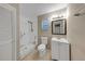 Bathroom featuring single shower, toilet and vanity with framed mirror at 1472 Belcher S Rd, Largo, FL 33771