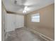 Bedroom with closet, ceiling fan, and one window featuring walls painted in neutral color at 1472 Belcher S Rd, Largo, FL 33771