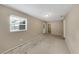 A bedroom with neutral walls and one window with blinds at 1472 Belcher S Rd, Largo, FL 33771