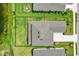 Aerial view of the property with a fenced backyard, patio and driveway at 16115 Mount Holly Dr, Bradenton, FL 34211