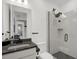 Modern bathroom featuring sleek fixtures and glass-enclosed shower at 16115 Mount Holly Dr, Bradenton, FL 34211