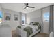 Cozy bedroom with natural light and a comfortable bed at 16115 Mount Holly Dr, Bradenton, FL 34211