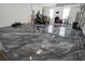 Epoxy-floored garage offering ample storage space at 16115 Mount Holly Dr, Bradenton, FL 34211