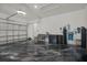 Well-organized garage with epoxy flooring and water filtration system at 16115 Mount Holly Dr, Bradenton, FL 34211