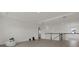 Spacious loft area featuring hardwood floors, ample natural light, and modern railing at 16115 Mount Holly Dr, Bradenton, FL 34211