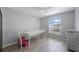 Cozy bedroom with a large window and unique toddler bed at 17809 Sandpine Trace Way, Tampa, FL 33647
