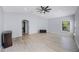 Bonus room with vaulted ceiling, wood-look flooring, and a ceiling fan at 17809 Sandpine Trace Way, Tampa, FL 33647