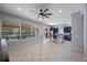 Spacious kitchen and living area with stainless steel appliances and central island with seating at 17809 Sandpine Trace Way, Tampa, FL 33647