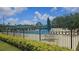 Community swimming pool with ample seating and a sunny atmosphere at 17809 Sandpine Trace Way, Tampa, FL 33647