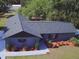 An aerial view displays the home's lovely exterior, featuring a well-manicured lawn and landscaping at 17933 Eagle Ln, Lutz, FL 33558