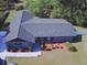 A beautiful aerial view of the house reveals its charming curb appeal and nicely landscaped front yard at 17933 Eagle Ln, Lutz, FL 33558