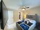 bedroom complete with ceiling fan and lots of space, offering a peaceful place to rest at 17933 Eagle Ln, Lutz, FL 33558